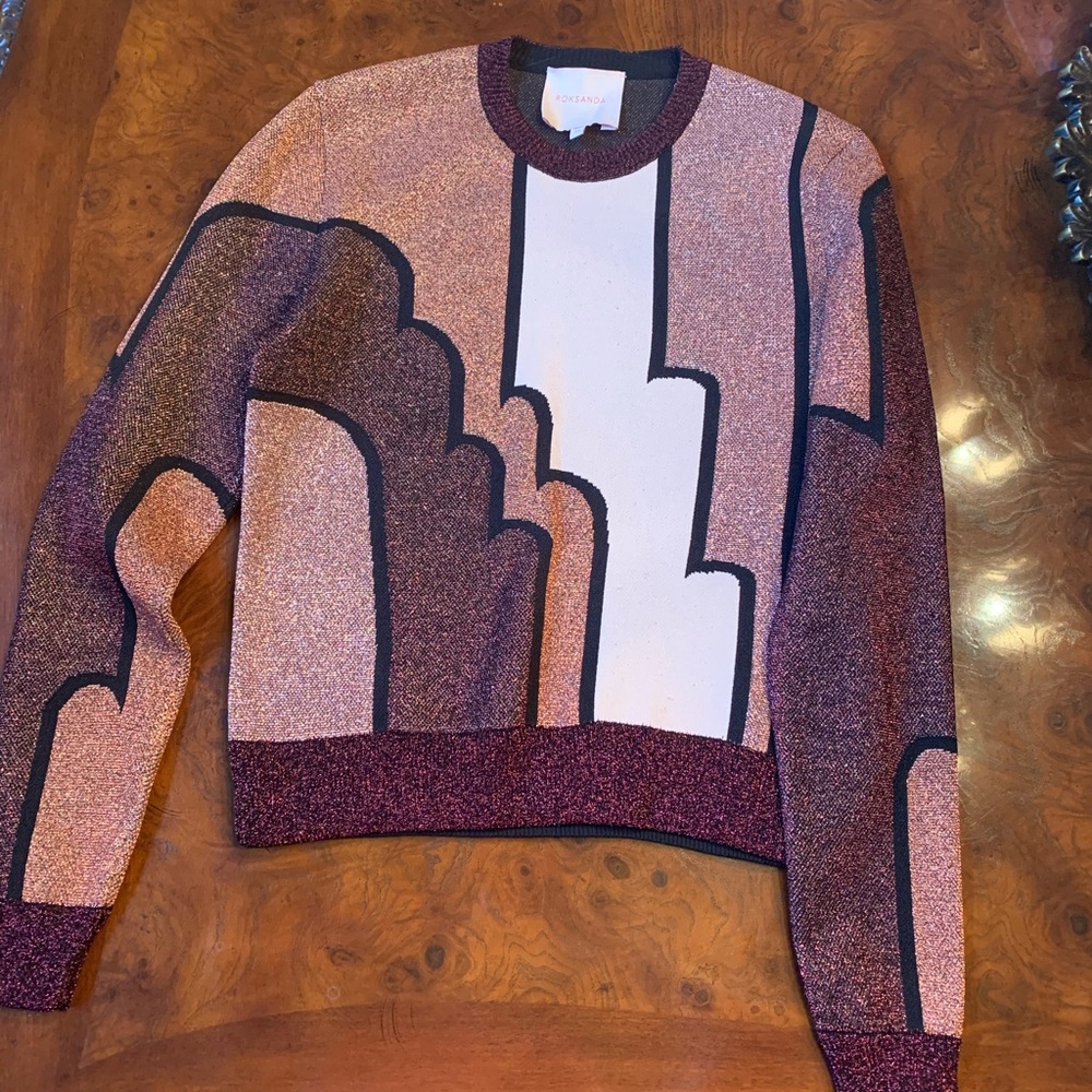 a women’s glittery sweater